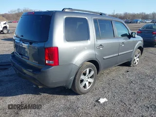 2012 Honda Pilot Touring with VIN 5FNYF3H9XCB042090, listed as a IAAI auction lot 41751359 with 140,424 mi miles and . Bid and sale history available at carsss.com. Image 4.