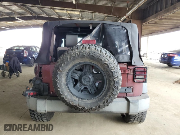 2008 Jeep Wrangler X with VIN 1J4FA241X8L541485, listed as a Copart auction lot 54050235 with 145,748 mi miles and Salvage title. Bid and sale history available at DreamBid. Image 6.