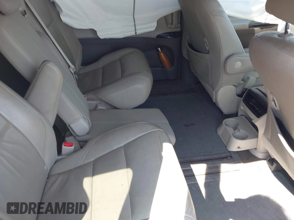 2015 Toyota Sienna XLE with VIN 5TDYK3DC0FS649998, listed as a IAAI auction lot 42531828 with 111,539 mi miles and . Bid and sale history available at DreamBid. Image 8.