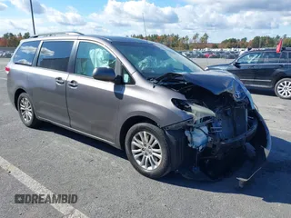 2014 Toyota Sienna XLE with VIN 5TDYK3DC1ES472036, listed as a IAAI auction lot 40546573 with 134,907 mi miles and . Bid and sale history available at DreamBid. Image 1.