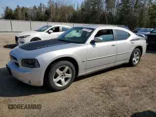 2010 Dodge Charger SXT with VIN 2B3CA3CV5AH233504, listed as a Copart auction lot 51800395 with 253,535 mi miles and Salvage Title. Bid and sale history available at carsss.com. Image 1.