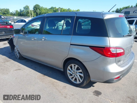 2012 Mazda 5 Sport with VIN JM1CW2BLXC0129303, listed as a IAAI auction lot 42556899 with 200,863 mi miles and . Bid and sale history available at DreamBid. Image 3.