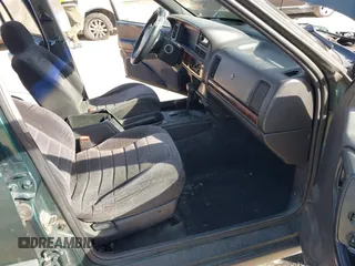 1997 Jeep Grand Cherokee Laredo with VIN 1J4GZ58S2VC595442, listed as a IAAI auction lot 41772133 with 229,764 mi miles. Bid and sale history available at carsss.com. Image 5.
