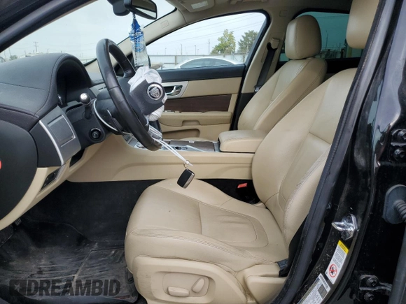 2013 Jaguar XF V6 SC with VIN SAJWJ0EF3D8S85693, listed as a Copart auction lot 75660304 with 70,565 mi miles and Salvage Title. Bid and sale history available at carsss.com. Image 7.