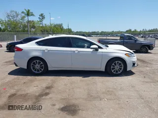 2020 Ford Fusion SE with VIN 3FA6P0HD1LR132613, listed as a IAAI auction lot 42051569 with 48,324 mi miles and . Bid and sale history available at carsss.com. Image 13.