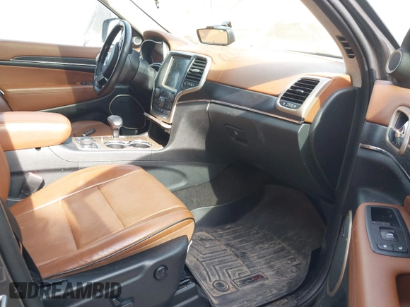 2015 Jeep Grand Cherokee Summit with VIN 1C4RJFJT1FC726330, listed as a IAAI auction lot 41781127 with 138,425 mi miles. Bid and sale history available at carsss.com. Image 5.