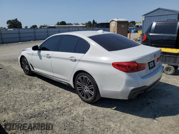 2020 BMW 5 Series 530e with VIN WBAJA9C03LCD28842, listed as a Copart auction lot 69901984 with 63,036 mi miles and Salvage Title. Bid and sale history available at DreamBid. Image 2.