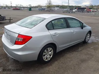 2012 Honda Civic Sdn LX with VIN 19XFB2F50CE353837, listed as a IAAI auction lot 41961162 with 140,583 mi miles. Bid and sale history available at carsss.com. Image 4.