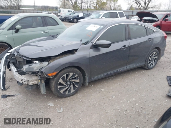 2018 Honda Civic EX with VIN 2HGFC2F79JH570403, listed as a IAAI auction lot 42018123 with 165,821 mi miles and . Bid and sale history available at DreamBid. Image 17.