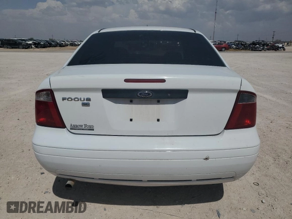 2007 Ford Focus S z VIN 1FAFP34N27W186716, wystawiony jako Copart lot #54894055 z przebiegiem 86 305 mil mil oraz Szkoda całkowita • Salvage title. Historia ofert i sprzedaży dostępna na DreamBid. Obrazek 6.