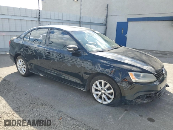 2011 Volkswagen Jetta SE with VIN 3VWDZ7AJ8BM383450, listed as a Copart auction lot 80899484 with 191,498 mi miles and Salvage title. Bid and sale history available at DreamBid. Image 4.