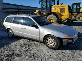 2001 Saturn LW z VIN 1G8JU82F31Y506377, wystawiony jako Copart lot #89013205 z przebiegiem 142 166 mil mil oraz Szkody całkowita. Historia ofert i sprzedaży dostępna na DreamBid. Obrazek 4.