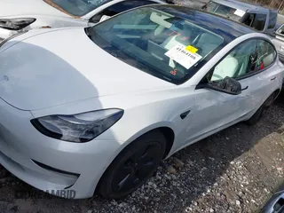2021 Tesla Model 3 Long Range with VIN 5YJ3E1EB1MF056759, listed as a IAAI auction lot 41464108 with 48,694 mi miles and . Bid and sale history available at carsss.com. Image 2.
