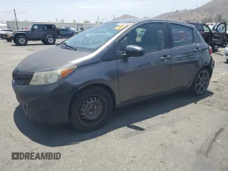 2012 Toyota Yaris L with VIN JTDKTUD36CD530918, listed as a Copart auction lot 60548965 with 242,149 mi miles and Salvage title. Bid and sale history available at DreamBid. Image 1.