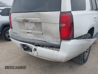 2015 Chevrolet Tahoe LS with VIN 1GNSCAEC2FR641252, listed as a IAAI auction lot 41528667 with 183,796 mi miles and . Bid and sale history available at DreamBid. Image 6.