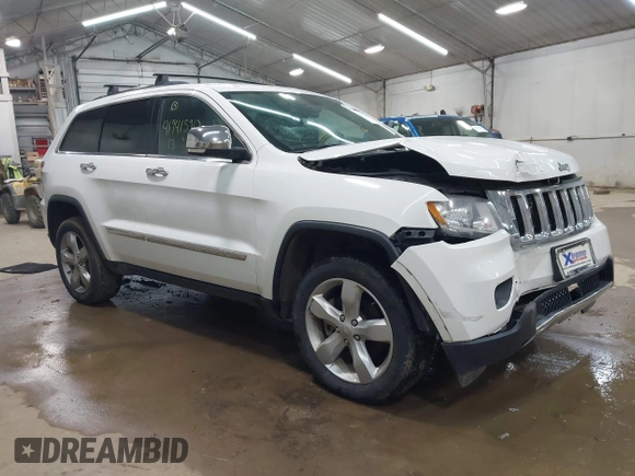 2013 Jeep Grand Cherokee Overland with VIN 1C4RJFCT1DC586886, listed as a IAAI auction lot 41941590 with 125,126 mi miles. Bid and sale history available at carsss.com. Image 1.