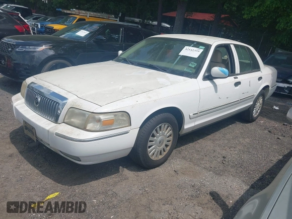 2008 Mercury Grand Marquis LS with VIN 2MEFM75VX8X600015, listed as a IAAI auction lot 42142359 with 310,481 mi miles and . Bid and sale history available at DreamBid. Image 2.