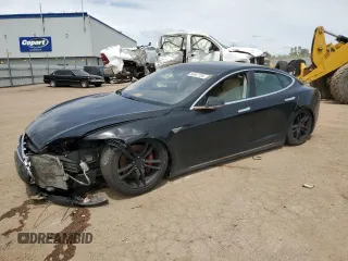 2015 Tesla Model S 85D with VIN 5YJSA1H45FF083471, listed as a Copart auction lot 56947734 with 101,648 mi miles and Salvage Title. Bid and sale history available at carsss.com. Image 1.