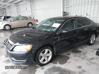 2014 Volkswagen Passat S with VIN 1VWAT7A37EC035831, listed as a IAAI auction lot 42648263 with 118,081 mi miles and . Bid and sale history available at DreamBid. Image 2.