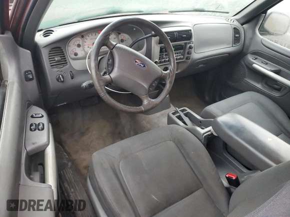 2001 Ford Explorer Sport z VIN 1FMYU60E91UC97278, wystawiony jako Copart lot #88458495 z przebiegiem 210 260 mil mil oraz Szkoda całkowita • Salvage title. Historia ofert i sprzedaży dostępna na DreamBid. Obrazek 8.