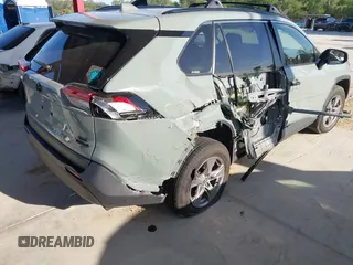2022 Toyota RAV4 Hybrid XLE with VIN JTMRWRFV9NJ054668, listed as a IAAI auction lot 42606261 with 61,794 mi miles and . Bid and sale history available at DreamBid. Image 4.