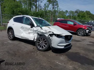 2018 Mazda CX-5 Grand Touring z VIN JM3KFADM2J1383369, wystawiony jako IAAI lot #42172827 z przebiegiem 173 353 mil mil oraz . Historia ofert i sprzedaży dostępna na DreamBid. Obrazek 1.