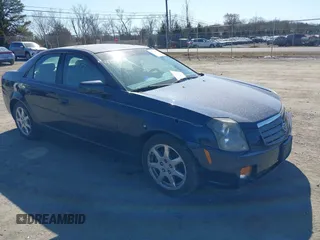 2003 Cadillac CTS with VIN 1G6DM57N030107996, listed as a IAAI auction lot 41764179 with 142,000 mi miles. Bid and sale history available at carsss.com. Image 1.