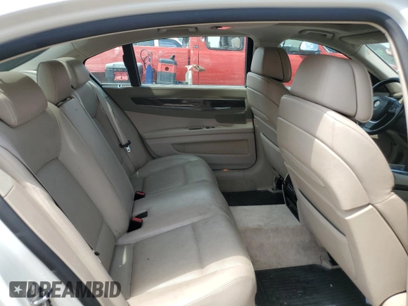 2009 BMW 7 Series 750Li with VIN WBAKB83599CY58147, listed as a Copart auction lot 59238475 with 124,336 mi miles and Salvage title. Bid and sale history available at DreamBid. Image 10.