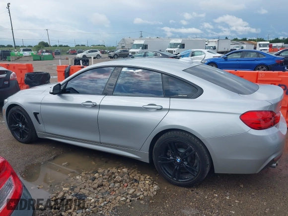 2015 BMW 4 Series 428i xDrive with VIN WBA4C9C50FD330482, listed as a IAAI auction lot 42116547 with 192,739 mi miles and . Bid and sale history available at DreamBid. Image 14.