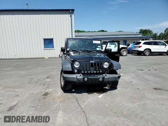 2014 Jeep Wrangler Sport with VIN 1C4AJWAG2EL113843, listed as a Copart auction lot 62771115 with 70,089 mi miles and Salvage title. Bid and sale history available at DreamBid. Image 14.