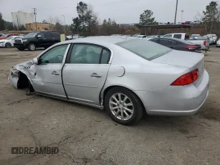 2009 Buick Lucerne CXL-4 with VIN 1G4HD57129U107443, listed as a Copart auction lot 46073045 with 146,157 mi miles and Salvage Title. Bid and sale history available at carsss.com. Image 2.