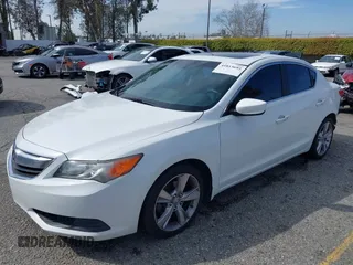 2014 Acura ILX with VIN 19VDE1F34EE011312, listed as a IAAI auction lot 41813693 with 107,032 mi miles. Bid and sale history available at carsss.com. Image 2.