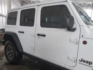 2024 Jeep Wrangler Rubicon with VIN 1C4PJXFG7RW334190, listed as a IAAI auction lot 42332948 with 14,272 mi miles and . Bid and sale history available at DreamBid. Image 13.