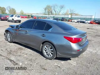 2015 Infiniti Q50 Premium with VIN JN1BV7AR2FM392399, listed as a IAAI auction lot 41978343 with 108,679 mi miles and . Bid and sale history available at DreamBid. Image 3.