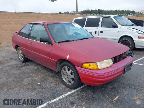 1994 Ford Escort z VIN 1FARP11J8RW128776, wystawiony jako IAAI lot #41502714 z przebiegiem 61 582 mil mil oraz . Historia ofert i sprzedaży dostępna na DreamBid. Obrazek 1.
