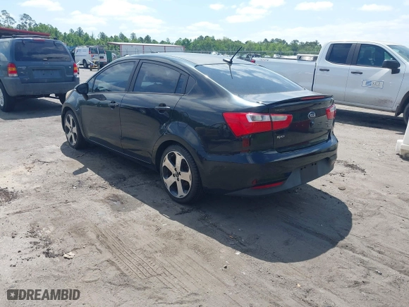 2016 Kia Rio EX with VIN KNADN4A34G6575984, listed as a IAAI auction lot 42133630 with 126,704 mi miles. Bid and sale history available at carsss.com. Image 3.