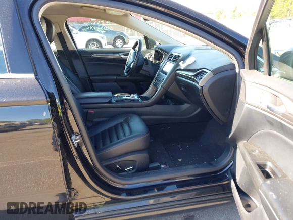 2019 Ford Fusion SEL with VIN 3FA6P0MU6KR252797, listed as a IAAI auction lot 41994504 with 106,029 mi miles and . Bid and sale history available at DreamBid. Image 5.