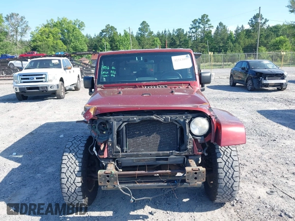 2007 Jeep Wrangler Unlimited Sahara с VIN 1J8GA59187L211825, выставлен на аукционе IAAI как лот 42313099 с пробегом 107 554 миль миль и . История ставок и продаж доступна на DreamBid. Изображение 13.