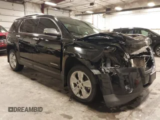 2015 GMC Terrain SLE z VIN 2GKFLWE35F6390315, wystawiony jako IAAI lot #40987206 z przebiegiem 100 214 mil mil oraz . Historia ofert i sprzedaży dostępna na DreamBid. Obrazek 1.