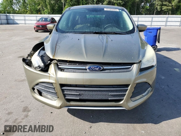 2014 Ford Escape SE z VIN 1FMCU0GX2EUA26924, wystawiony jako Copart lot #55389485 z przebiegiem 102 537 mil mil oraz Szkoda całkowita • Salvage title. Historia ofert i sprzedaży dostępna na DreamBid. Obrazek 5.