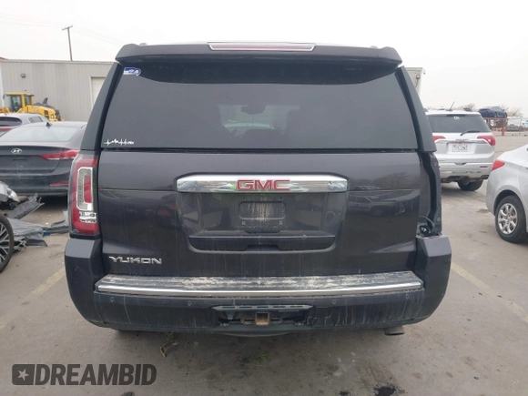 2015 GMC Yukon Denali with VIN 1GKS2CKJ2FR705806, listed as a IAAI auction lot 41568322 with 171,011 mi miles. Bid and sale history available at carsss.com. Image 16.