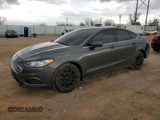 2018 Ford Fusion S z VIN 3FA6P0G75JR129528, wystawiony jako Copart lot #47671605 z przebiegiem 105 034 mil mil oraz Szkoda całkowita • Salvage title. Historia ofert i sprzedaży dostępna na DreamBid. Obrazek 1.