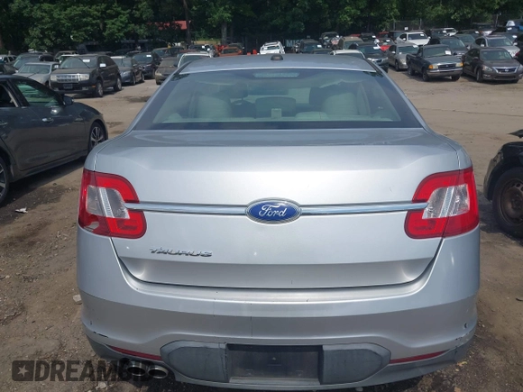 2011 Ford Taurus SE with VIN 1FAHP2DW9BG179423, listed as a IAAI auction lot 39683731 with 297,445 mi miles. Bid and sale history available at carsss.com. Image 16.