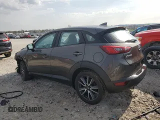 2018 Mazda CX-3 Touring z VIN JM1DKDC79J0311181, wystawiony jako Copart lot #54307795 z przebiegiem 141 348 mil mil oraz Czysty tytuł • Clean title. Historia ofert i sprzedaży dostępna na DreamBid. Obrazek 2.