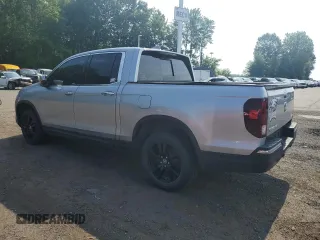 2018 Honda Ridgeline RTL-E with VIN 5FPYK3F77JB014975, listed as a Copart auction lot 59798125 with 124,361 mi miles and Clean title. Bid and sale history available at DreamBid. Image 2.