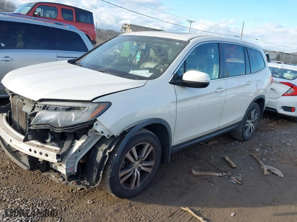 2016 Honda Pilot EX-L with VIN 5FNYF6H59GB025365, listed as a IAAI auction lot 41118130 with 141,530 mi miles. Bid and sale history available at carsss.com. Image 17.