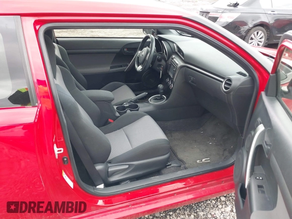 2014 Scion tC z VIN JTKJF5C76E3078810, wystawiony jako IAAI lot #41638613 z przebiegiem 76 648 mil mil oraz . Historia ofert i sprzedaży dostępna na DreamBid. Obrazek 5.