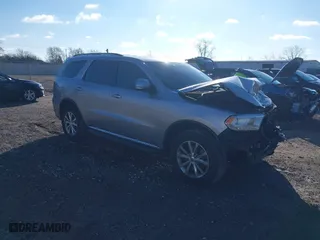 2014 Dodge Durango Limited with VIN 1C4SDJDT7EC349198, listed as a IAAI auction lot 40811926 with 258,652 mi miles. Bid and sale history available at carsss.com. Image 1.