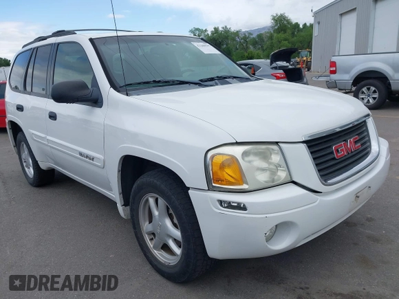 2005 GMC Envoy SLE z VIN 1GKDT13S652279384, wystawiony jako IAAI lot #42208597 z przebiegiem 147 036 mil mil oraz . Historia ofert i sprzedaży dostępna na DreamBid. Obrazek 1.