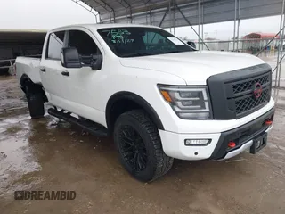 2024 Nissan Titan Pro-4X with VIN 1N6AA1EDXRN105077, listed as a IAAI auction lot 41545734 with 8,505 mi miles and . Bid and sale history available at DreamBid. Image 1.
